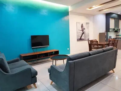 a living room with two couches and a tv at W21 atGoldenHills NightMarket WiFi 4R in Cameron Highlands