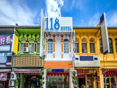 a group of colorful buildings in a street at 118 Hotel,Dato Keramat - Self Check In in George Town