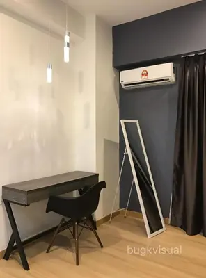 a desk and a chair in a room at Luxury Seaview Family Suite by Little Cabin in George Town
