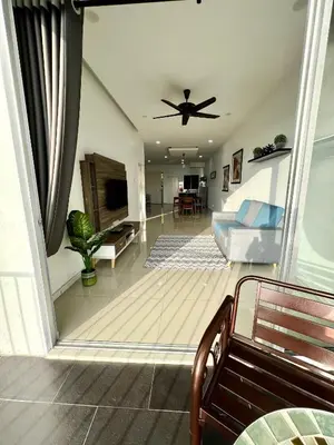 a living room with a ceiling fan and a couch at Home Away from Home in Taiping - 3R4B Family & Group Friendly! in Taiping