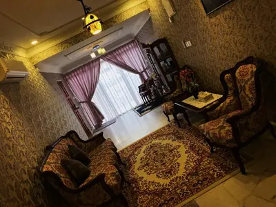 an aerial view of a living room with a window at Bayan Baru Homestay @ Taman Sri Nibong in George Town