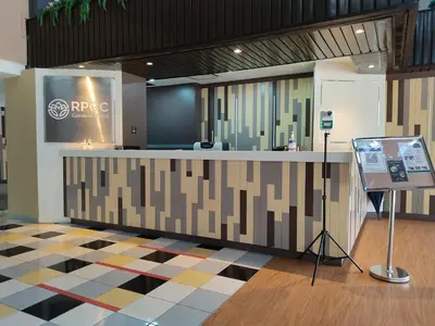 a store lobby with a counter with a display at RPGC Garden Hotel in Ipoh