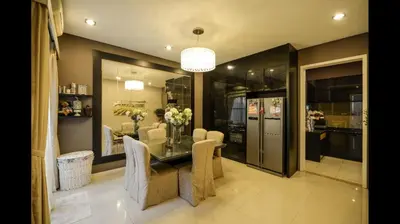 a dining room with a glass table and chairs at The heaven in sunway ipoh in Ipoh