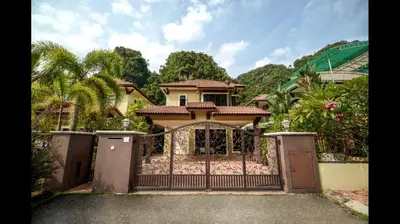 a house with a gate in front of it at The heaven in sunway ipoh in Ipoh