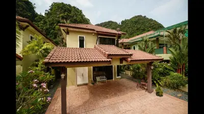 a house with a tiled roof on a courtyard at The heaven in sunway ipoh in Ipoh