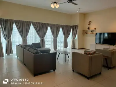 a living room with a couch and chairs and a tv at Sekinchan HighView Penthouse 15pax 5R5B \u9876\u5c42\u516c\u5bd3 \u770b\u6d77 \u770b\u7a3b\u7530\u666f in Sekincan