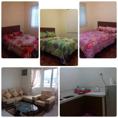 a collage of four pictures of a bedroom at D'Puncak Arabella Muslim Homestay in Cameron Highlands
