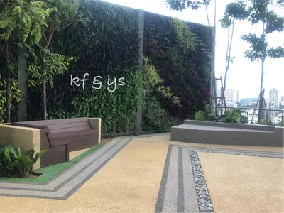 a wall with a bench in front of a building at Tropicana 218 Macalister in George Town