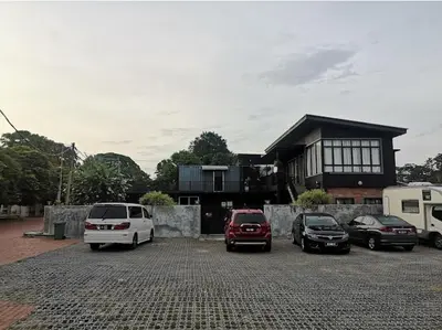 a group of cars parked in front of a house at Safar House & Cabin (Muslim) in Kuala Kangsar