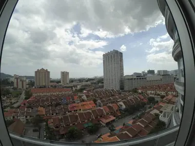 a view of a city from a window at On Cloud 9 @ CEO by Joal in Bayan Lepas