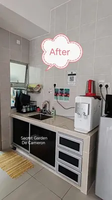 a kitchen with a counter with a sink and a microwave at Penthouse - Secret Garden de Cameron, Night Market in Tanah Rata