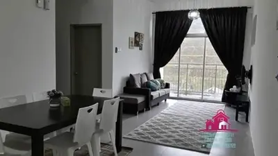 a living room with a dining room table and a couch at Little Dream (Muslim) Homestay @ Cameron Highlands in Brinchang