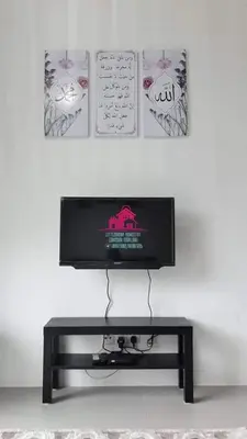 a flat screen tv sitting on top of a table at Little Dream (Muslim) Homestay @ Cameron Highlands in Brinchang