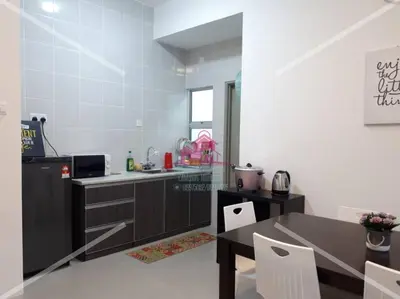 a kitchen with a table and a counter top at Little Dream (Muslim) Homestay @ Cameron Highlands in Brinchang