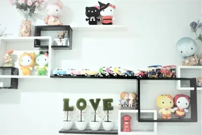 a room with shelves filled with stuffed animals at Ks Homestay in Taiping