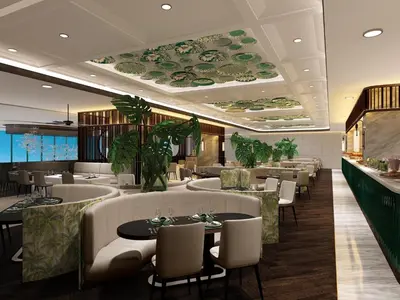 a restaurant with tables and chairs and a bar at Ascott Gurney Penang in George Town
