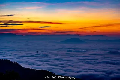 a view of the sunset from above the clouds at Hickory Penang Hill in George Town