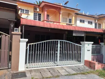 a white gate in front of a house at AsSalam Homestay in Seri Iskandar