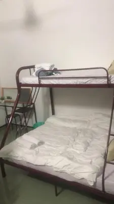 a couple of bunk beds in a room at The Alley's @ Sitiawan, Manjung in Sitiawan