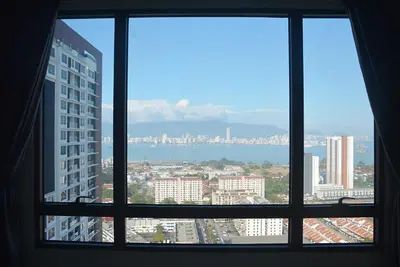 a view of a city from a window at Mevin Woodsbury Butterworth Homestay in Butterworth