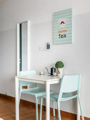 a white table and chairs in a room at Casita 22, 218 Macalister Georgetown City & Seaview in George Town