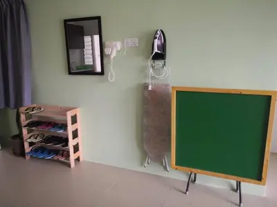 a classroom with a chalk board next to a chalkboard gmaxwell gmaxwell gmaxwell at My Homestay S1311 - Golden Hills Night Market in Cameron Highlands