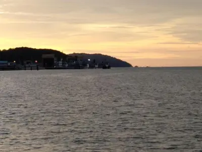 a view of a body of water at sunset at Desair Apartment By SCHT in Lumut
