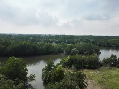 an aerial view of a river with trees at Desair Apartment By SCHT in Lumut