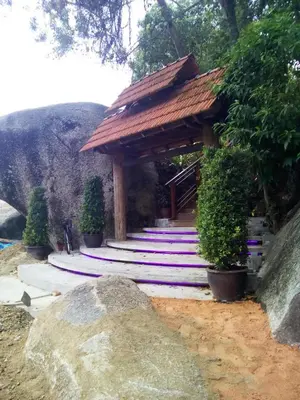 a stairway with a gazebo with plants at 8 Boutique By The Sea in George Town