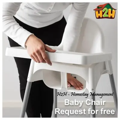 a woman holding a baby chair request for free at H2H - Summer Holidays Majestic Ipoh in Ipoh