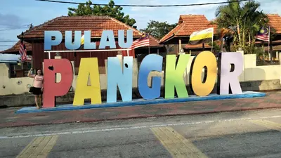 a sign that says pua pua marrow on the side of a street at 2sty Villa - Walking Distance To The Beach in Pangkor