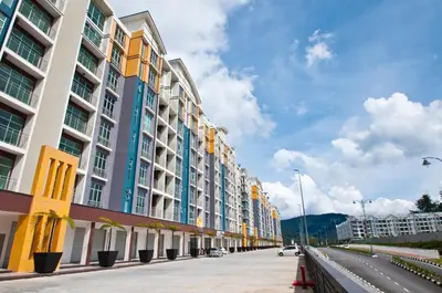 a row of tall buildings on a city street at DreamScape Studio @ Golden Hill Cameron in Cameron Highlands