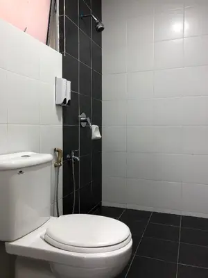 a bathroom with a toilet and a shower at DreamScape Studio @ Golden Hill Cameron in Cameron Highlands
