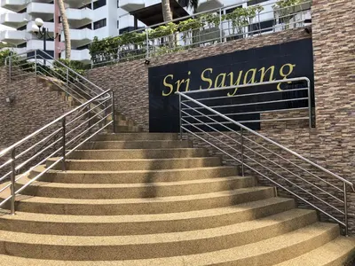 a set of stairs in front of a building at Susie's VIP Resort Seaview Suite at Sri Sayang in Batu Ferringhi