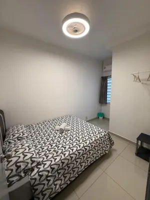 a bedroom with a bed with a teddy bear on it at De Little Cabin - 7mins to Sunway Iost World of Tambun in Ipoh