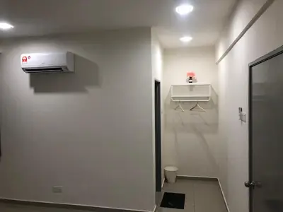 a white bathroom with a air conditioner on the wall at De Little Cabin - 7mins to Sunway Iost World of Tambun in Ipoh