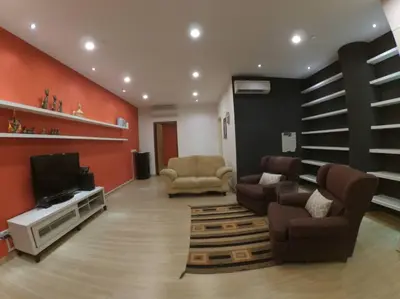 a living room with a couch and chairs and a television at Selamat Datang @ 118 Island Plaza Superior Suite in Tanjong Tokong