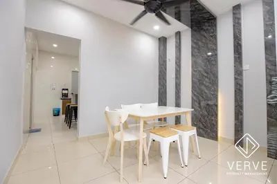 a dining room with a white table and chairs at Ipoh Luxury Suites by Verve (18 Pax) EECH16 in Ipoh