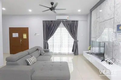 a living room with a gray couch and a window at Ipoh Luxury Suites by Verve (18 Pax) EECH16 in Ipoh