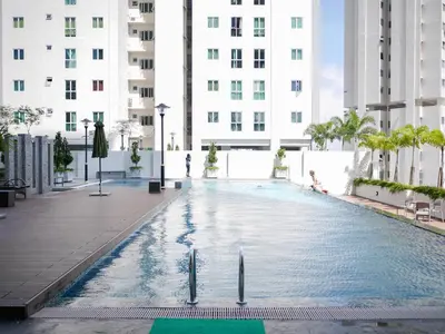 a swimming pool in the middle of a building at Penang Straits Garden Condominium Georgetown in George Town