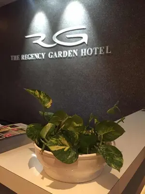 a potted plant sitting on top of a table at The Regency Garden Hotel in Ipoh
