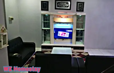 a living room with a tv in a room at Double Storey @ Tapah in Tapah