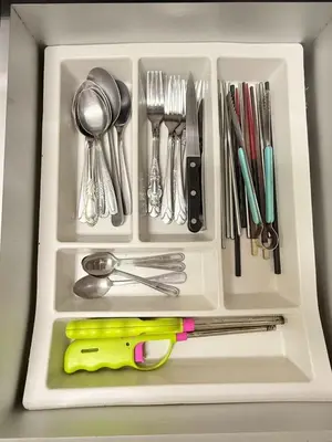 a white tray filled with utensils in a drawer at The Haven Retreat B7-2-1 ( Silverpark) in Bukit Fraser