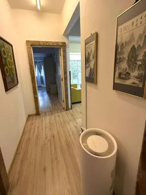 a hallway with a room with a fan in a room at The Haven Retreat B7-2-1 ( Silverpark) in Bukit Fraser