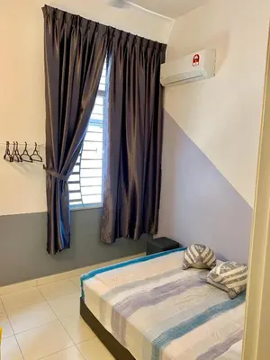 a bedroom with a bed and a window at BRAND NEW Cosy Minimalist Home in Butterworth