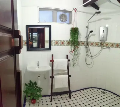 a bathroom with a sink and a toilet at Great Shanghai Guesthouse in George Town