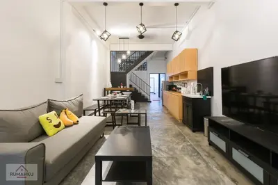 a living room with a couch and a table at Rumahku Express, Georgetown, Penang in George Town