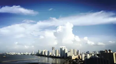 a view of a city with the ocean and buildings at The Landmark Condo, by Sanguine in George Town