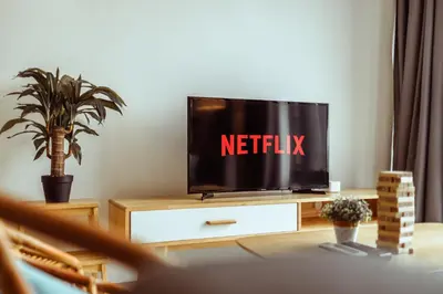 a tv sitting on a dresser with a netflix sign on it at Muji X Tiffany - City and Hill View 3BR at 218 Tropicana NEAR Komtar Food Heaven with Netflix & TV Box in George Town
