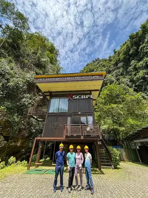 a group of four people standing in front of a building at Xscape Tambun in Ipoh